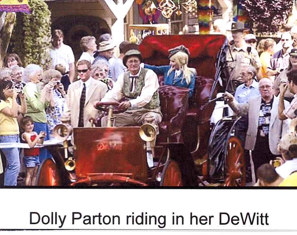 Dolly Parton riding in her DeWitt.