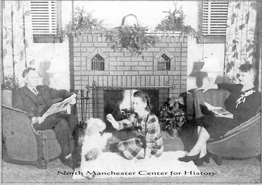 Christmas 1934. Mary Louis Little with her dog Waggle & parents